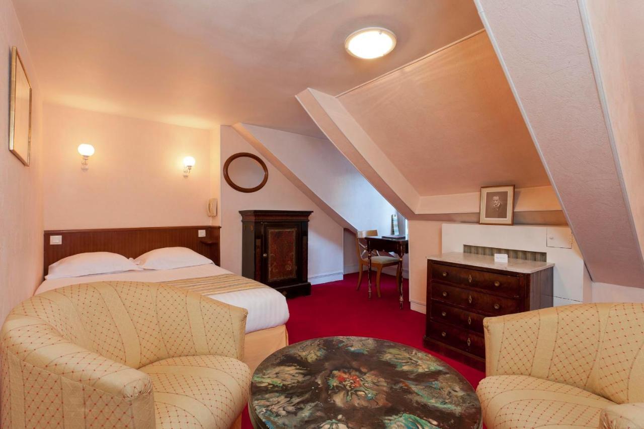 Hotel Du Quai Voltaire Paris Rom bilde